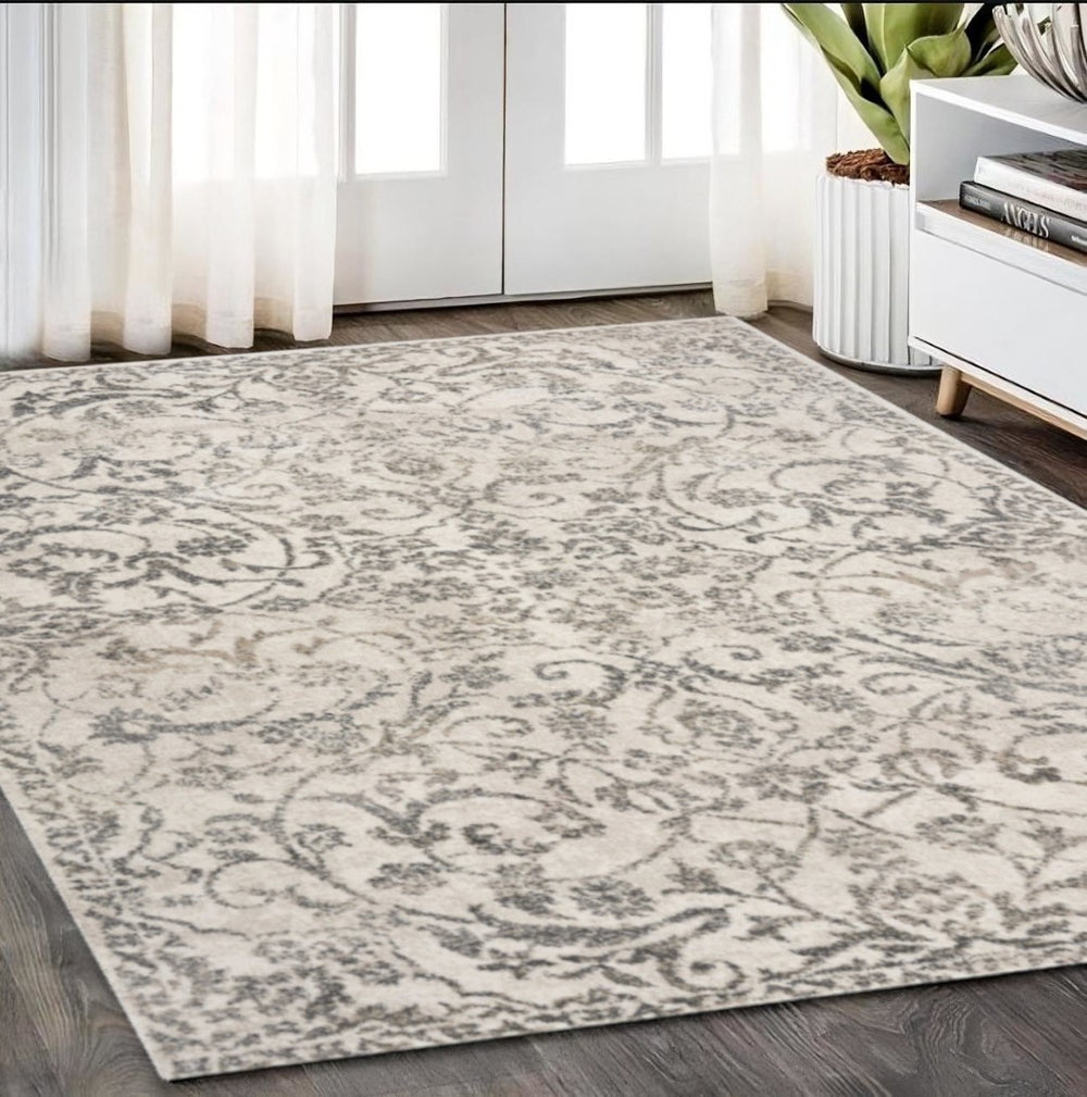 HomeRoots 8' Elegant Ivory and Brown Floral Medallion Area Rug for Vintage Charm in High-Traffic Spaces 5' X 8' 352933