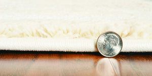 Homeroots 5' X 8' Ivory Grey Machine Woven Abstract Brushstrokes Indoor Area Rug  Polypropylene 352937