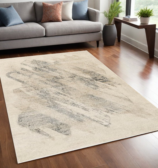 Homeroots 5' X 8' Ivory Grey Machine Woven Abstract Brushstrokes Indoor Area Rug  Polypropylene 352937