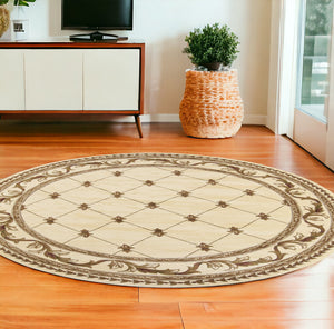 Homeroots 8' Ivory Machine Woven Hand Carved Fleur De Lis Round Indoor Area Rug  Polypropylene 352957