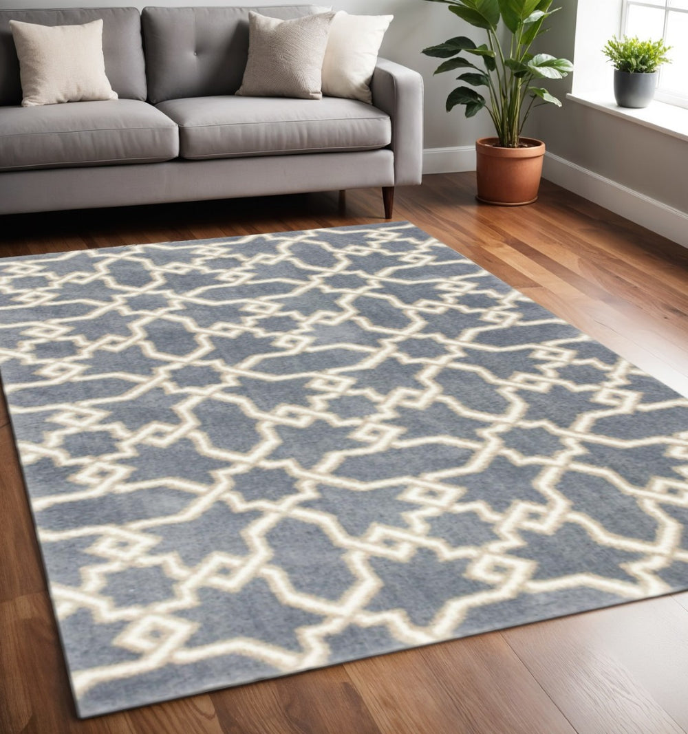 HomeRoots 5' Slate Blue and Ivory Geometric Area Rug - Modern Elegance for Cozy Living Spaces and Comfort 5' X 8' 353039