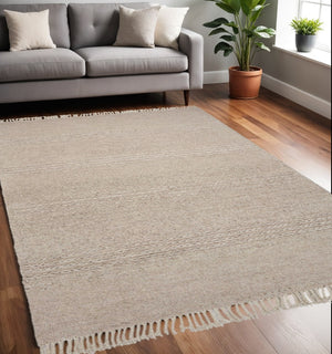 HomeRoots 7' Hand-Woven Beige Wool Area Rug - Soft, Durable, Artisan-Crafted for Timeless Elegance and Comfort 5' X 8' 353053