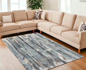 Homeroots 7' X 10' Teal Blue Machine Woven Abstract Stripes Indoor Area Rug  Polypropylene 353065