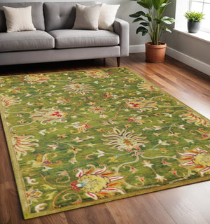 HomeRoots 8' Hand-Tufted Wool Area Rug with Elegant Floral Medallion Design in Rich Green, Red & Ivory Tones 5' X 8' 353139