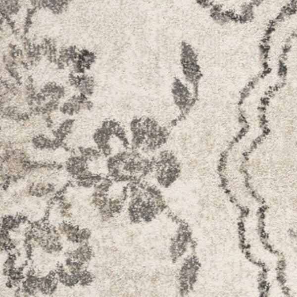 HomeRoots 8' Gray and Tan Floral Distressed Area Rug - Timeless Vintage Style for High-Traffic Family Spaces 3' X 5' 353865