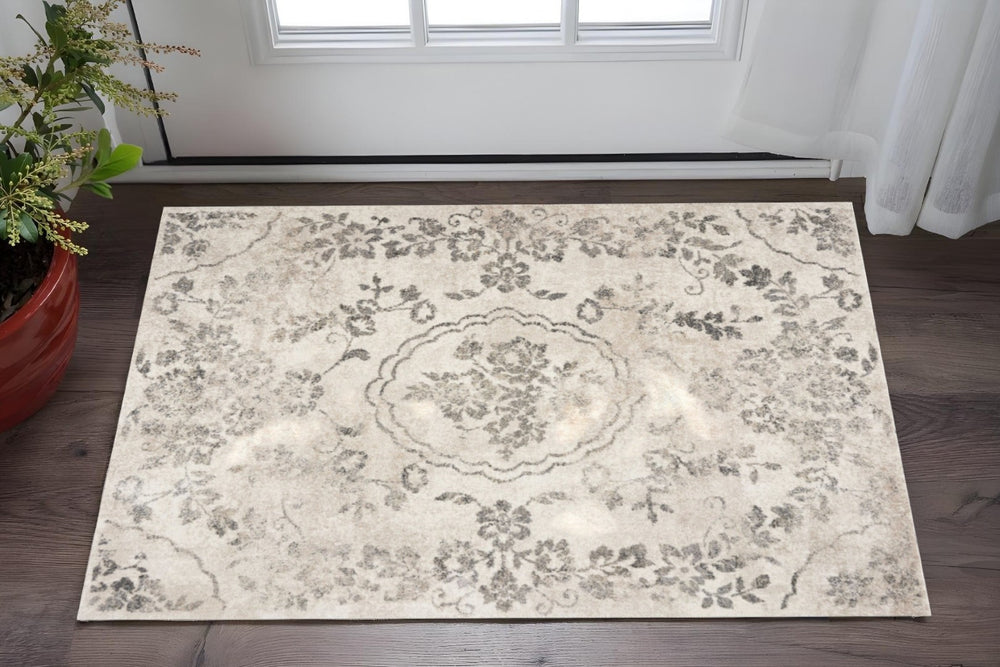 HomeRoots 8' Gray and Tan Floral Distressed Area Rug - Timeless Vintage Style for High-Traffic Family Spaces 3' X 5' 353865