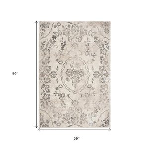 HomeRoots 8' Gray and Tan Floral Distressed Area Rug - Timeless Vintage Style for High-Traffic Family Spaces 3' X 5' 353865