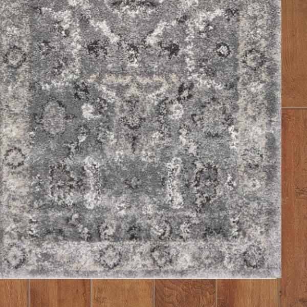 Homeroots 7' Gray Floral Worn Faded Runner Rug  Polypropylene 353870
