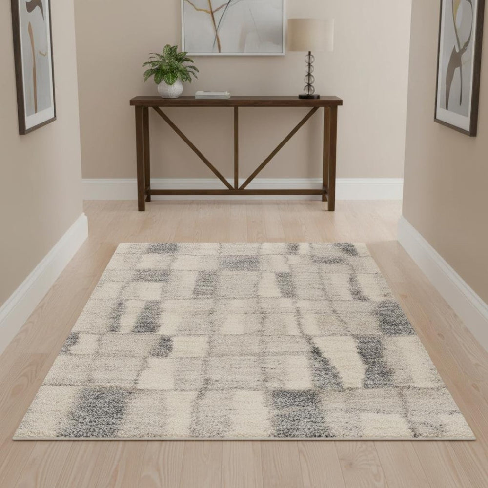 HomeRoots 9' Ivory and Blue Abstract Geometric Area Rug – Modern Elegance for Large Spaces, Durable Comfort 4' X 6' 353908