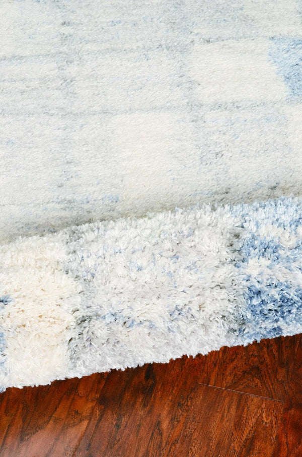 HomeRoots 9' Ivory and Blue Abstract Geometric Area Rug – Modern Elegance for Large Spaces, Durable Comfort 4' X 6' 353908