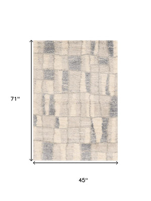 HomeRoots 9' Ivory and Blue Abstract Geometric Area Rug – Modern Elegance for Large Spaces, Durable Comfort 4' X 6' 353908