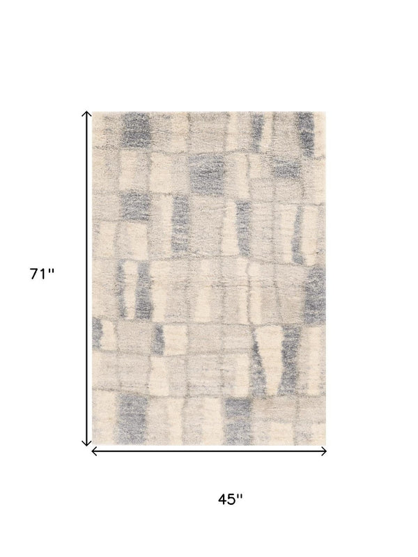 HomeRoots 9' Ivory and Blue Abstract Geometric Area Rug – Modern Elegance for Large Spaces, Durable Comfort 4' X 6' 353908