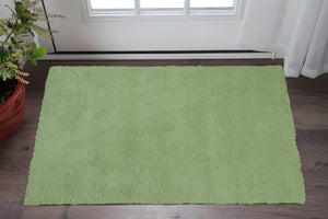 HomeRoots 8' Green Round Hand-Woven Area Rug - Artisan Crafted, Versatile Design for Living Spaces & Dining Rooms 3' X 5' 353913