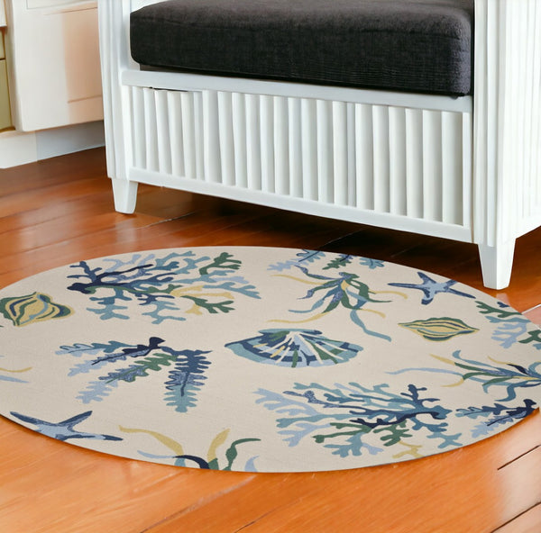 HomeRoots 3' Hand-Tufted Area Rug with Ivory and Blue Seashell Design – Coastal Charm for Any Room 7' Round 354135