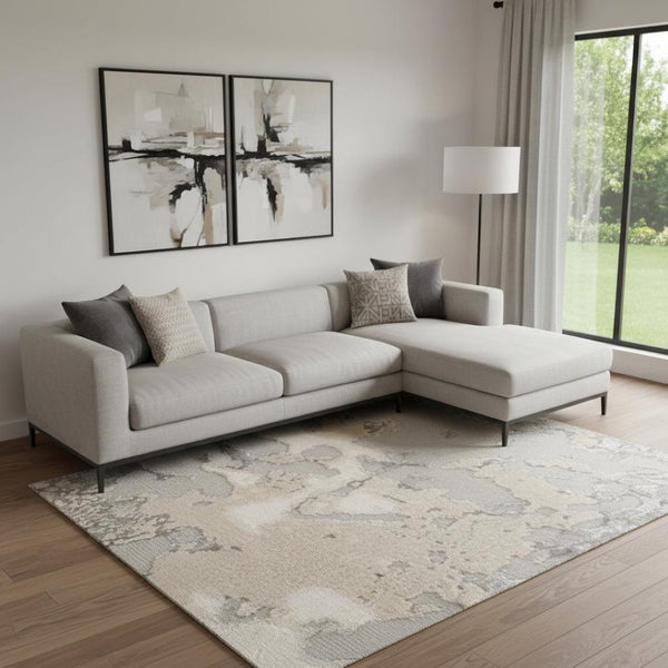 HomeRoots 9' Modern Abstract Area Rug in Sand Gray and Beige – Stylish Comfort for High-Traffic Spaces 7' X 10' 354141