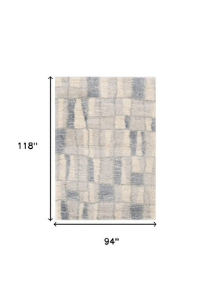 HomeRoots 9' Ivory and Blue Abstract Geometric Area Rug – Modern Elegance for Large Spaces, Durable Comfort 7' X 9' 354196