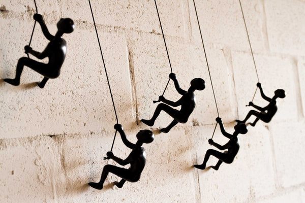 HomeRoots Set of Five Black Resin Climbing Men Sculptures - Modern 3D Wall Art for Unique Home Decor 358142