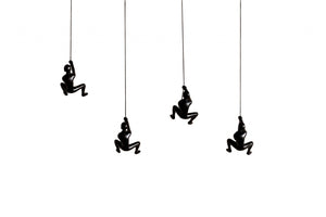 HomeRoots Set of Four Black Resin Climbing Men Sculptures - Dynamic Wall Art for Modern Living Spaces 358145
