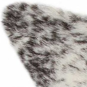 HomeRoots 4' X 5' Black and White Faux Fur Cowhide Area Rug - Soft, Washable, Modern Animal Print Accent Piece 358151