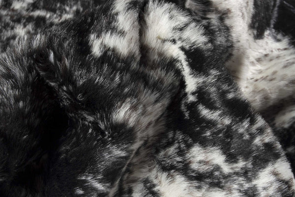 HomeRoots 5' X 8' Black And White Faux Fur Cowhide Area Rug - Luxurious, Washable, Modern Design for Any Space 358152