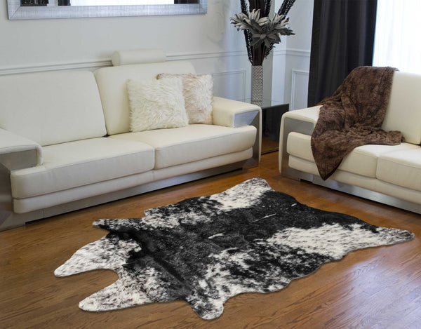 HomeRoots 5' X 8' Black And White Faux Fur Cowhide Area Rug - Luxurious, Washable, Modern Design for Any Space 358152