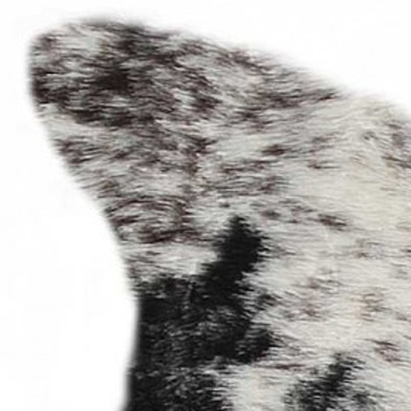 HomeRoots 5' X 8' Black And White Faux Fur Cowhide Area Rug - Luxurious, Washable, Modern Design for Any Space 358152