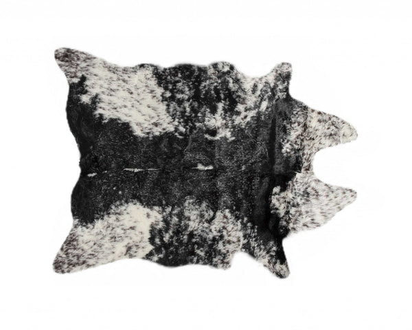 HomeRoots 5' X 8' Black And White Faux Fur Cowhide Area Rug - Luxurious, Washable, Modern Design for Any Space 358152