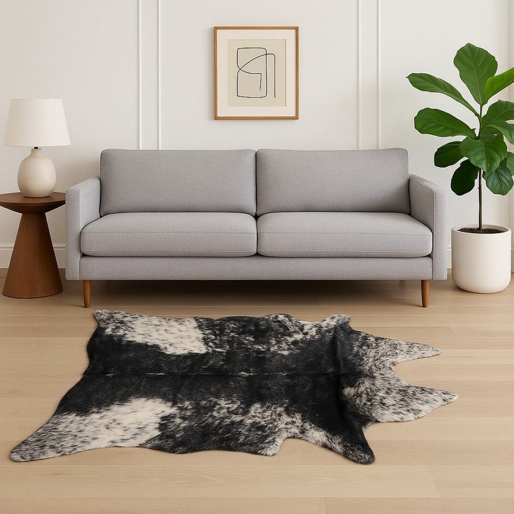 HomeRoots 5' X 8' Black And White Faux Fur Cowhide Area Rug - Luxurious, Washable, Modern Design for Any Space 358152