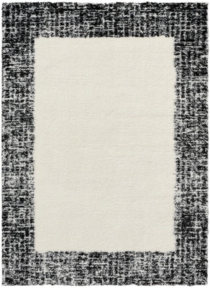 Nourison Pacific Shag PCS02 Machine Made Power-loomed Solid Border Indoor Only Shag Modern Rug Ivory Black, Ivory Black Pile, 100% Polyester 841491148877