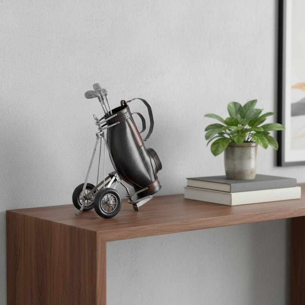 HomeRoots 6.5" Vintage Black Golf Bag Decor – Handcrafted Metal Cart with Rolling Wheels & Pen Holder Functionality 364177