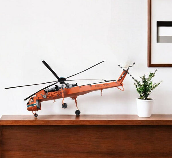 HomeRoots 12" Vintage Orange Metal Hand-Painted Airplane Sculpture - Unique Tabletop Accent for Any Room 364186
