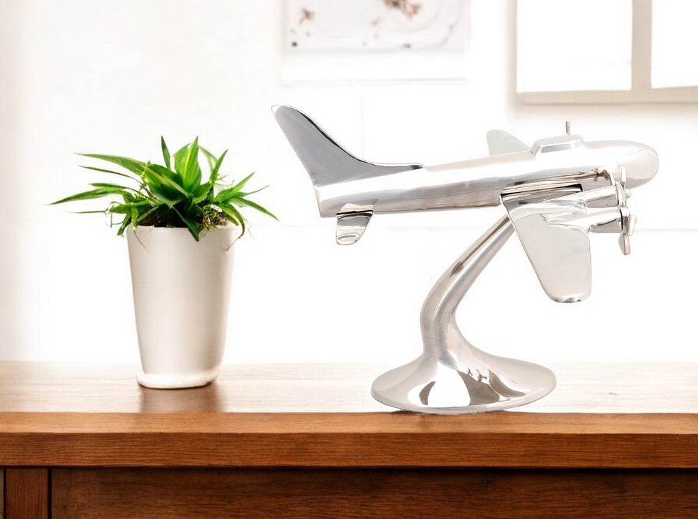 Homeroots 11" Nickel Metal Hand Painted Model Airplane Tabletop Sculpture  Metal 364195
