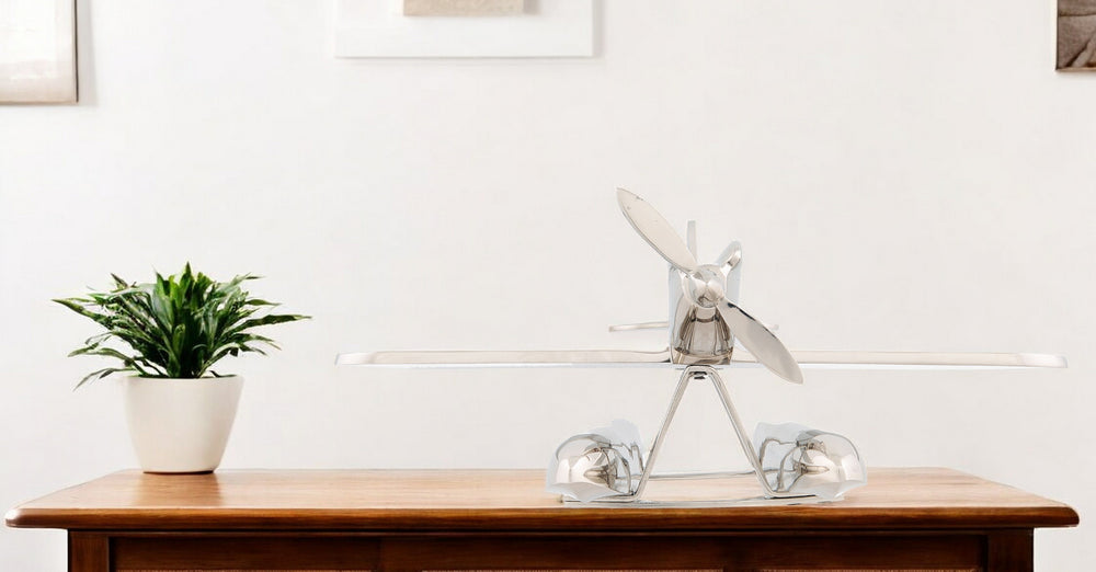 Homeroots 7" Nickel Metal Hand Painted Model Airplane Tabletop Sculpture  Metal 364200