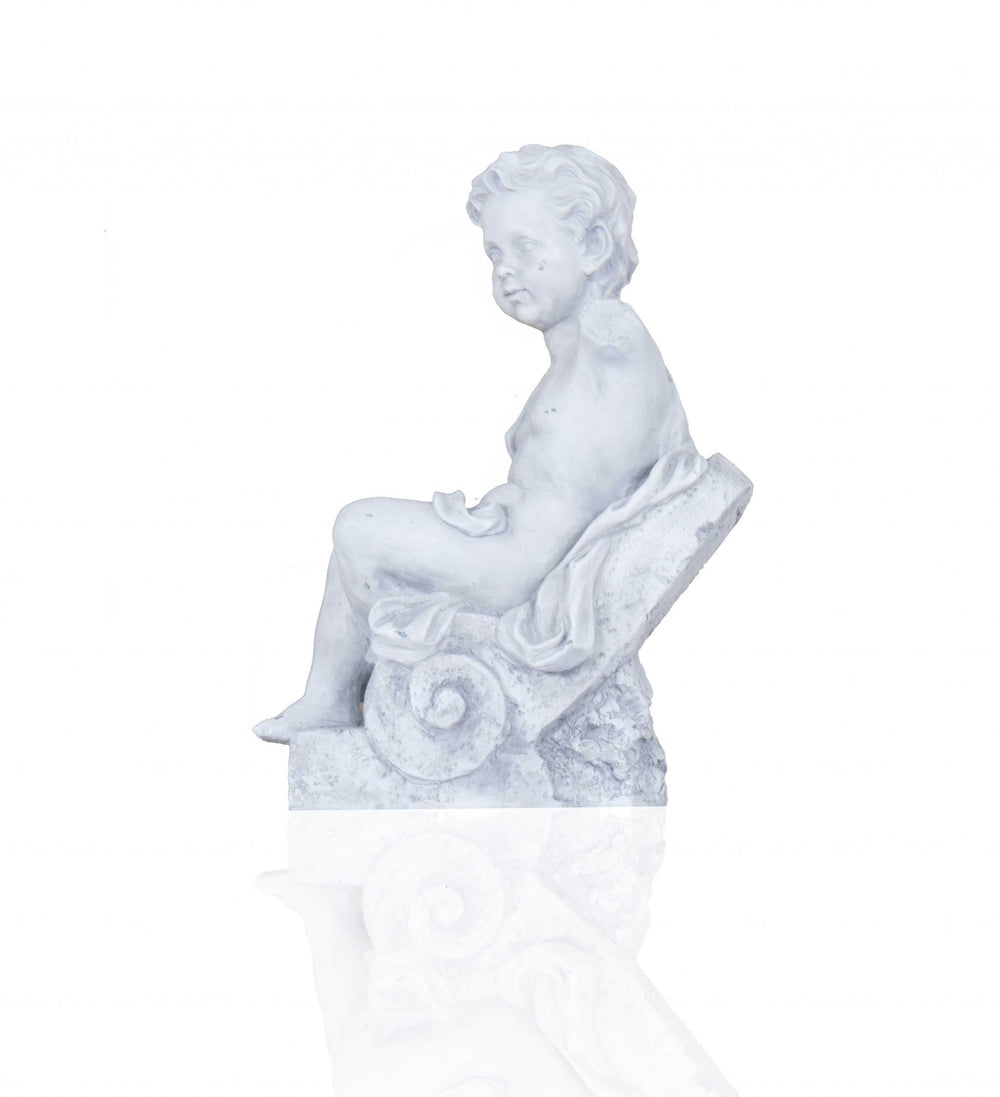 Homeroots Vintage Look Off White Boy Sitting Statue  Resin 364247