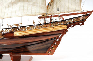 Homeroots 27" Brown Manufactured Wood Boat Hand Painted Sculpture  Solid Wood 364268