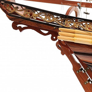 Homeroots 27" Brown Manufactured Wood Boat Hand Painted Sculpture  Solid Wood 364268