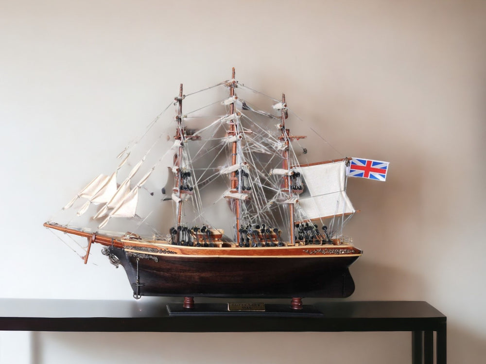 Homeroots 17" Brown Wood And Metal Hand Painted Cutty Sark Model Boat Tabletop Sculpture  Solid Wood 364381