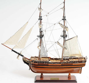 24 Inch Handcrafted Solid Wood Sailing Vessel Replica Coastal Home Decor Accent