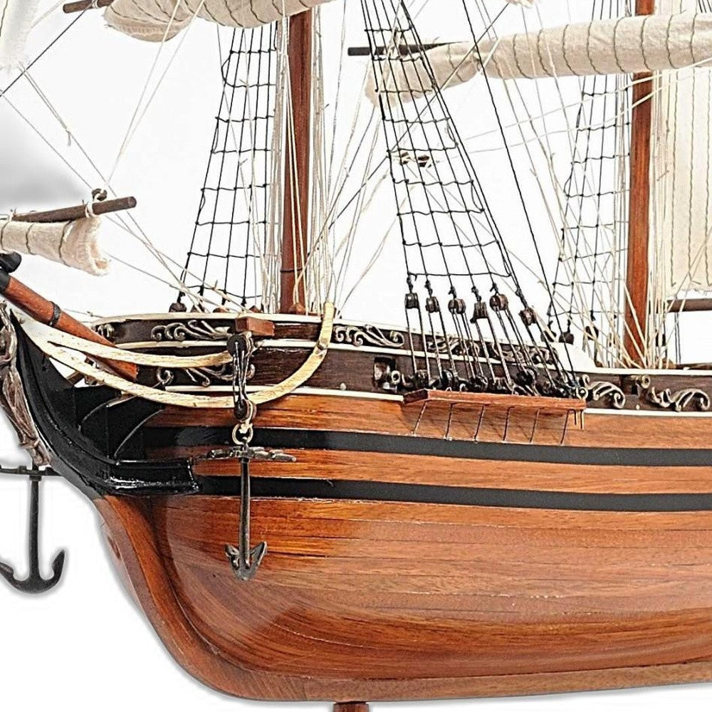 Homeroots 24" Brown Manufactured Wood Boat Hand Painted Sculpture  Solid Wood 364383