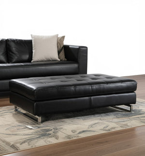 HomeRoots 63" Black Tufted Faux Leather Ottoman with Silver Legs - Modern, Versatile Seating for Any Room 366199