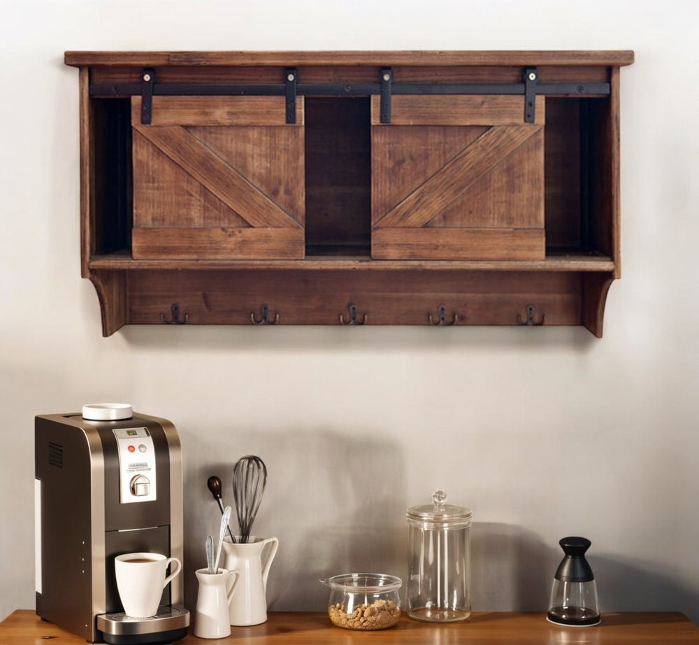 HomeRoots 40" Rustic Brown Wood Wall Shelf with Sliding Barn Door & 5 Hooks for Stylish Storage Solutions 370380