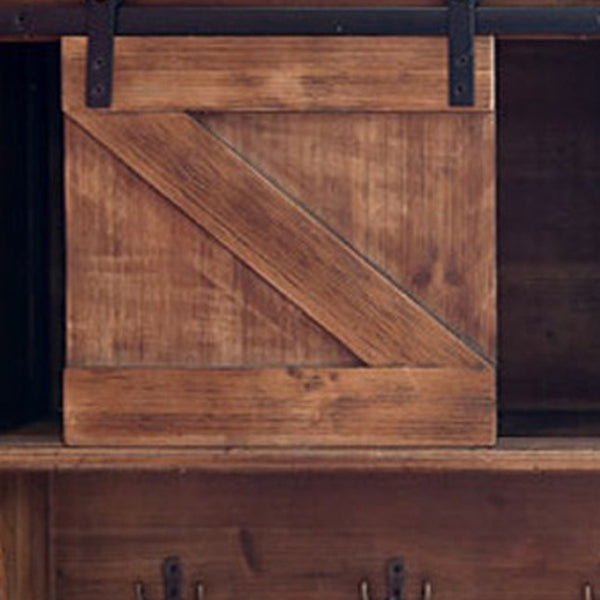 HomeRoots 40" Rustic Brown Wood Wall Shelf with Sliding Barn Door & 5 Hooks for Stylish Storage Solutions 370380