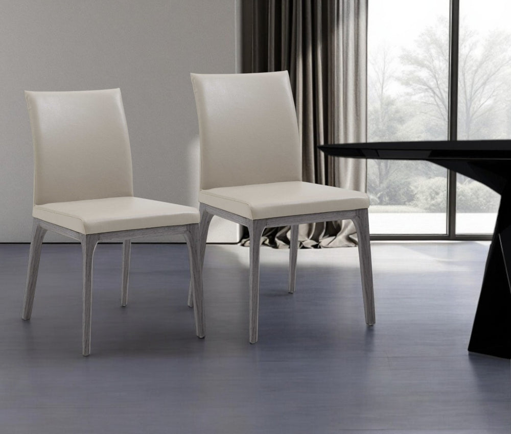 HomeRoots Set of Two Modern Taupe and Gray Faux Leather Dining Chairs – Stylish, Stackable, and Versatile! 370658