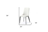 Homeroots Set Of Two White And Black Upholstered Faux Leather Dining S  Metal 370666