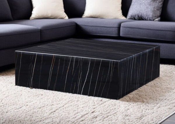 HomeRoots 35" Black Genuine Marble Coffee Table with Brass Accents – Modern Mobility & Chic Design for Any Space 372181