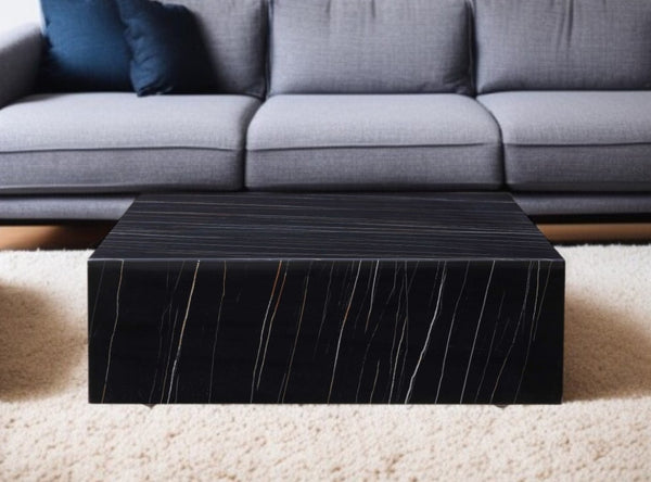 HomeRoots 35" Black Genuine Marble Coffee Table with Brass Accents – Modern Mobility & Chic Design for Any Space 372181