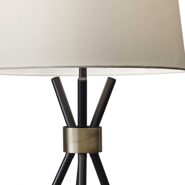 Homeroots Black Metal Tripod Leg With Antique Brass Accent Table Lamp   372639
