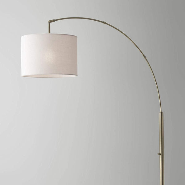 Homeroots 74" Brass Arc Floor Lamp With Off White Solid Color Drum Shade Brass Metal 372710