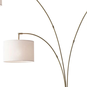 Homeroots 74" Brass Three Light Arc Floor Lamp With Off White Fabric Drum Shade Brass Metal 372712