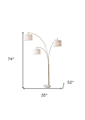 Homeroots 74" Brass Three Light Arc Floor Lamp With Off White Fabric Drum Shade Brass Metal 372712